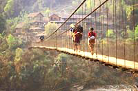 Porters on Suspension Bridge